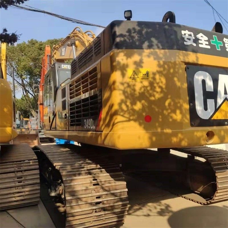 Подержанный экскаватор CAT 349E с емкостью в 1,2 м3 и рабочими часами 2001-4000