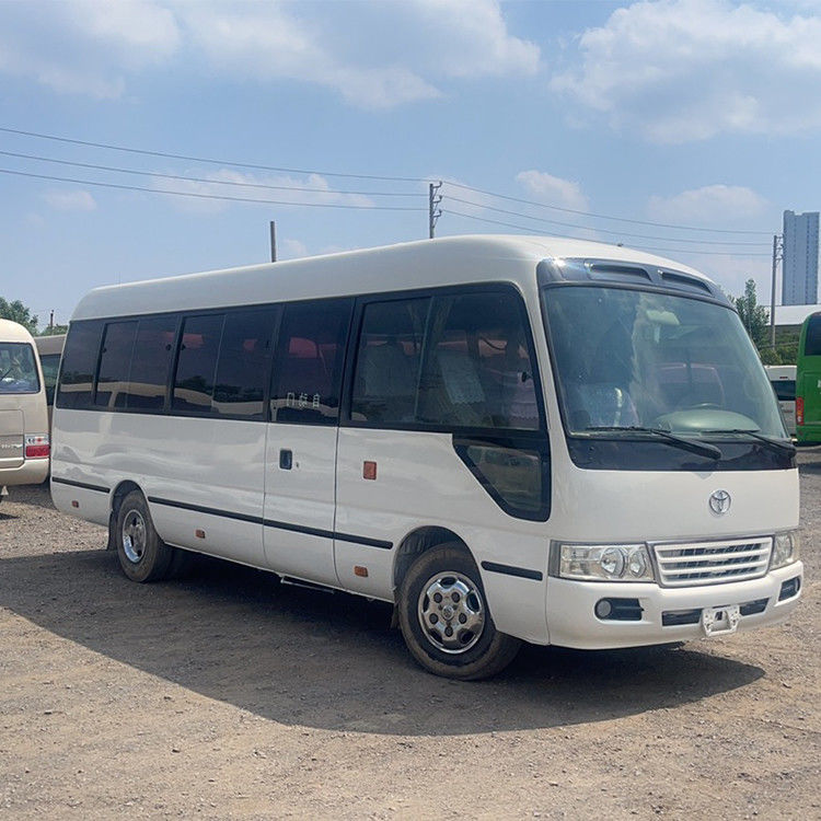 Автобус Toyota Coaster с левым приводом 26 мест и 30 мест Мини-автобус с двигателем вместимостью 4 л
