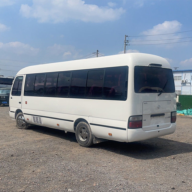 Автобус Toyota Coaster с левым приводом 26 мест и 30 мест Мини-автобус с двигателем вместимостью 4 л