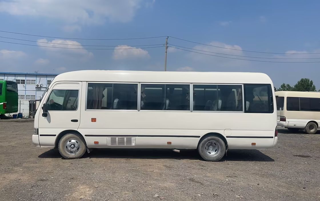 7м 30 мест Toyo Ta Coaster Автобусный двигатель вместимостью 4L Общие размеры мм 7725x2000x2600