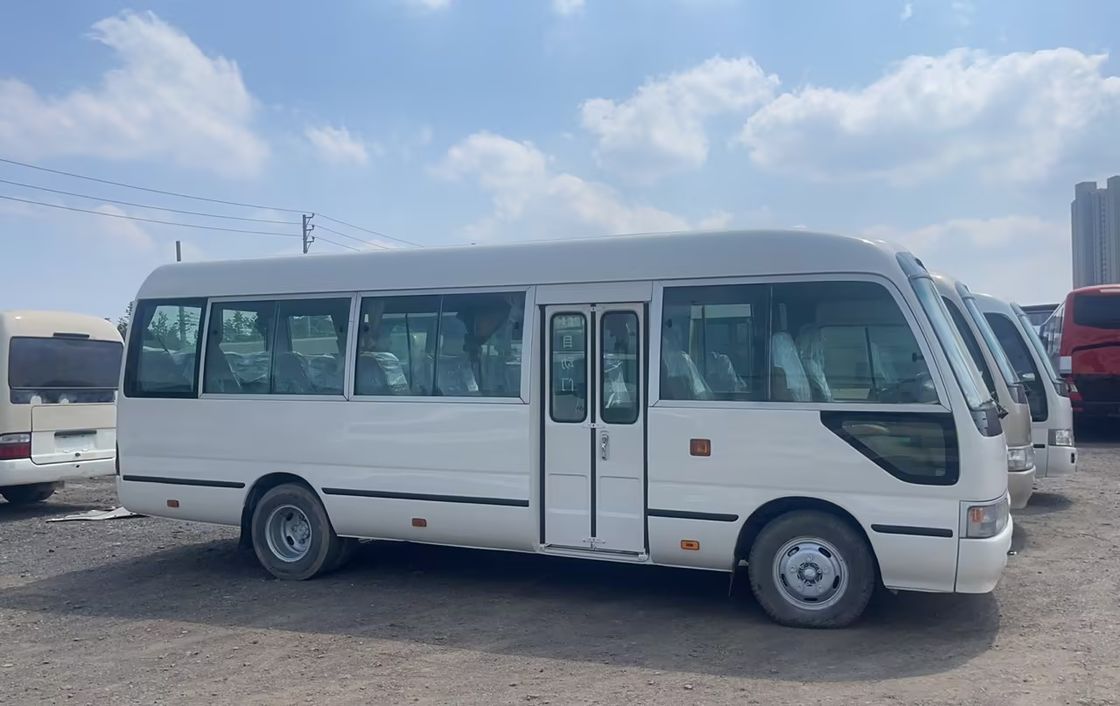 7м 30 мест Toyo Ta Coaster Автобусный двигатель вместимостью 4L Общие размеры мм 7725x2000x2600