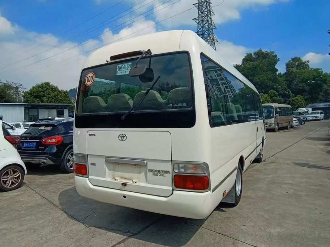 24 пассажирских автобуса Toyota Coaster Bus в Японии Удобный стиль 7005*2040*2785 мм