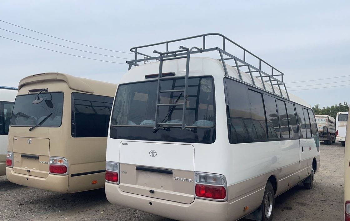 11. Туристический роскошный автобус 30 мест Подержанный дизельный Toyota Coaster Bus для туристической экскурсии