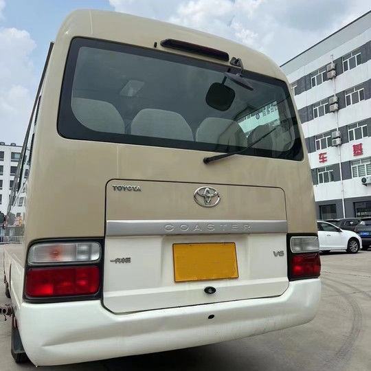 Модель 2023 бензиновый Toyota Coaster Bus 30 мест Моторная вместимость 4L 7005*2040*2785 мм